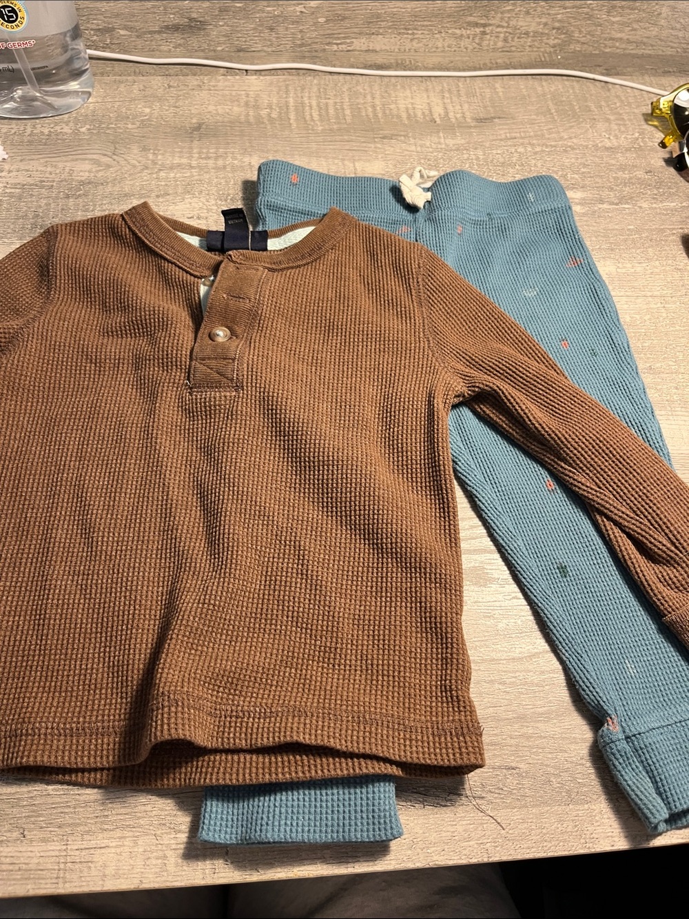 Cherokee Brown Henley Top with Light Blue Trim